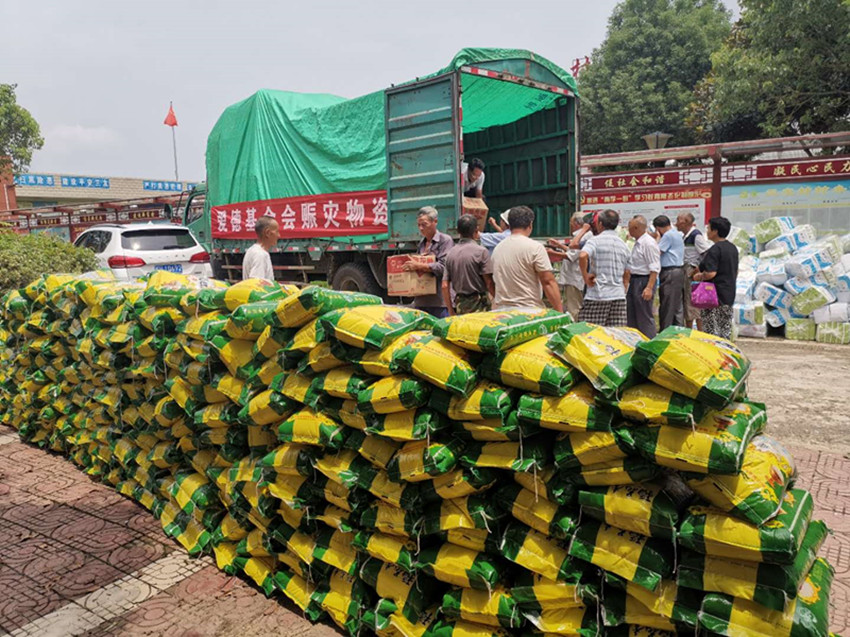 民建安庆市委会携手爱德基金会赴桐城市、太湖县赈灾